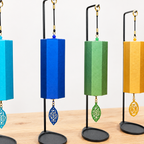 Seven Chakra Tuned wind Chimes with cast iron stands.