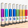 Seven Chakra Tuned wind Chimes with cast iron stands.