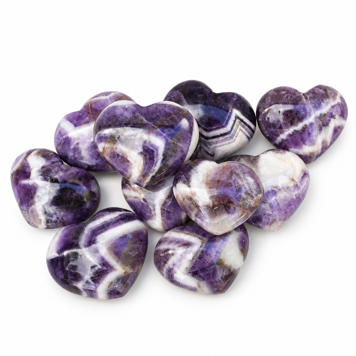 Group of polished Banded Amethyst heart-shaped palm stones showing natural variations