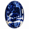 Oval polished Sodalite palm stone with deep blue colour and white veining