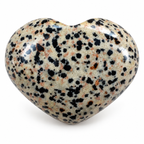 Polished Dalmatian Jasper heart-shaped palm stone showing natural colour and markings