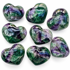Collection of polished green and purple Rainbow Fluorite crystal hearts