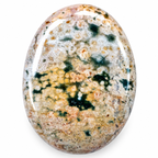 Polished Ocean Jasper palm stone showing natural colour and markings