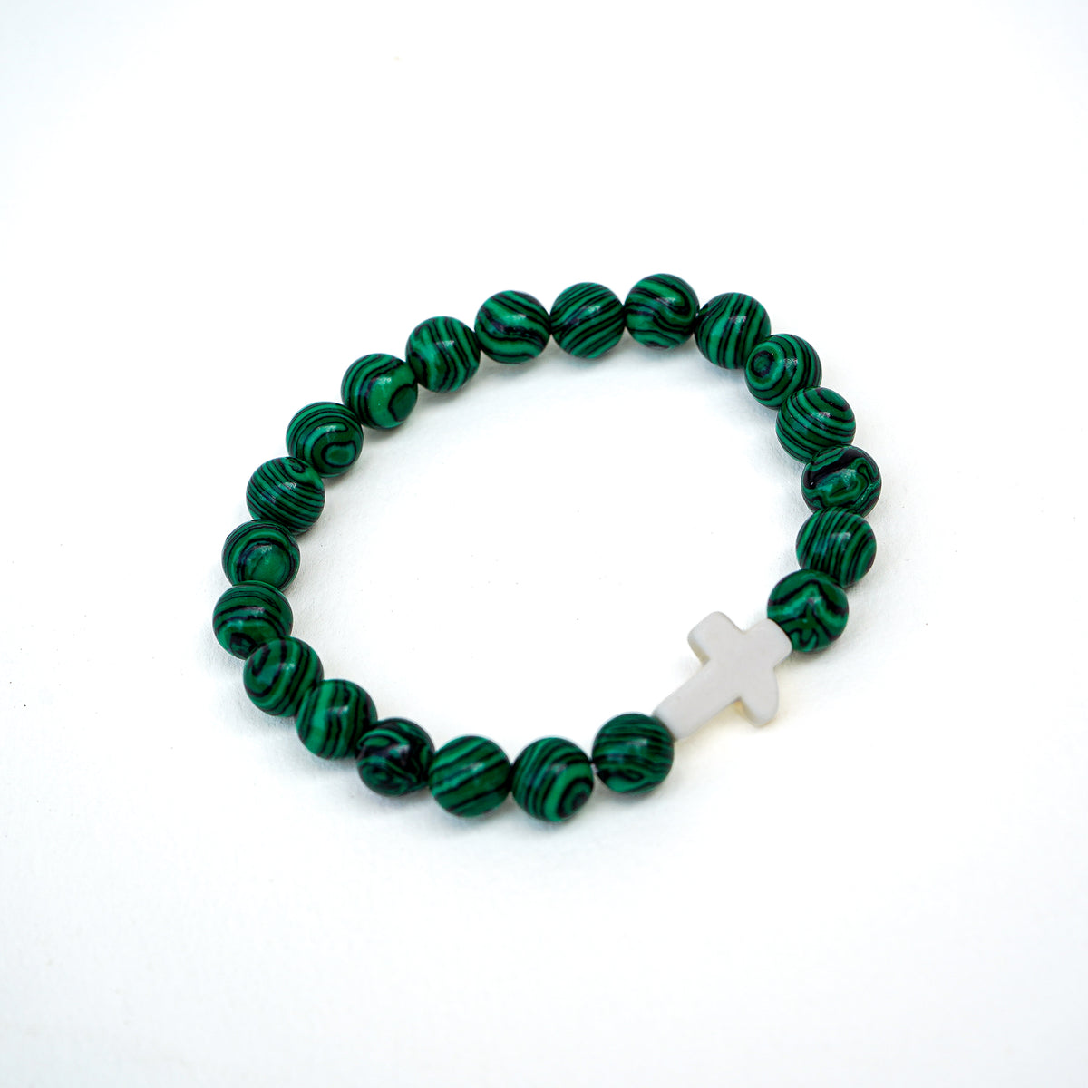 Malachite Bead Bracelet with Christian Cross – product photograph of the jewellery