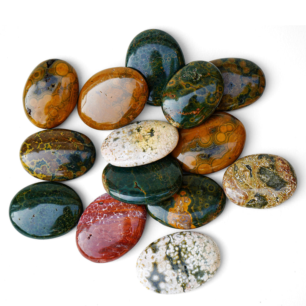 Polished Ocean Jasper palm stone showing natural colour and markings