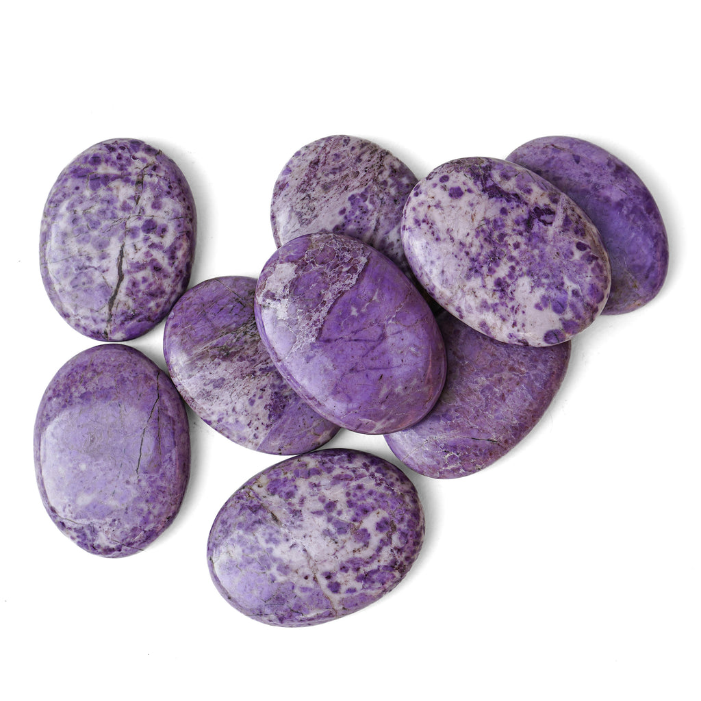 Polished Purple Jade palm stone showing natural colour and markings