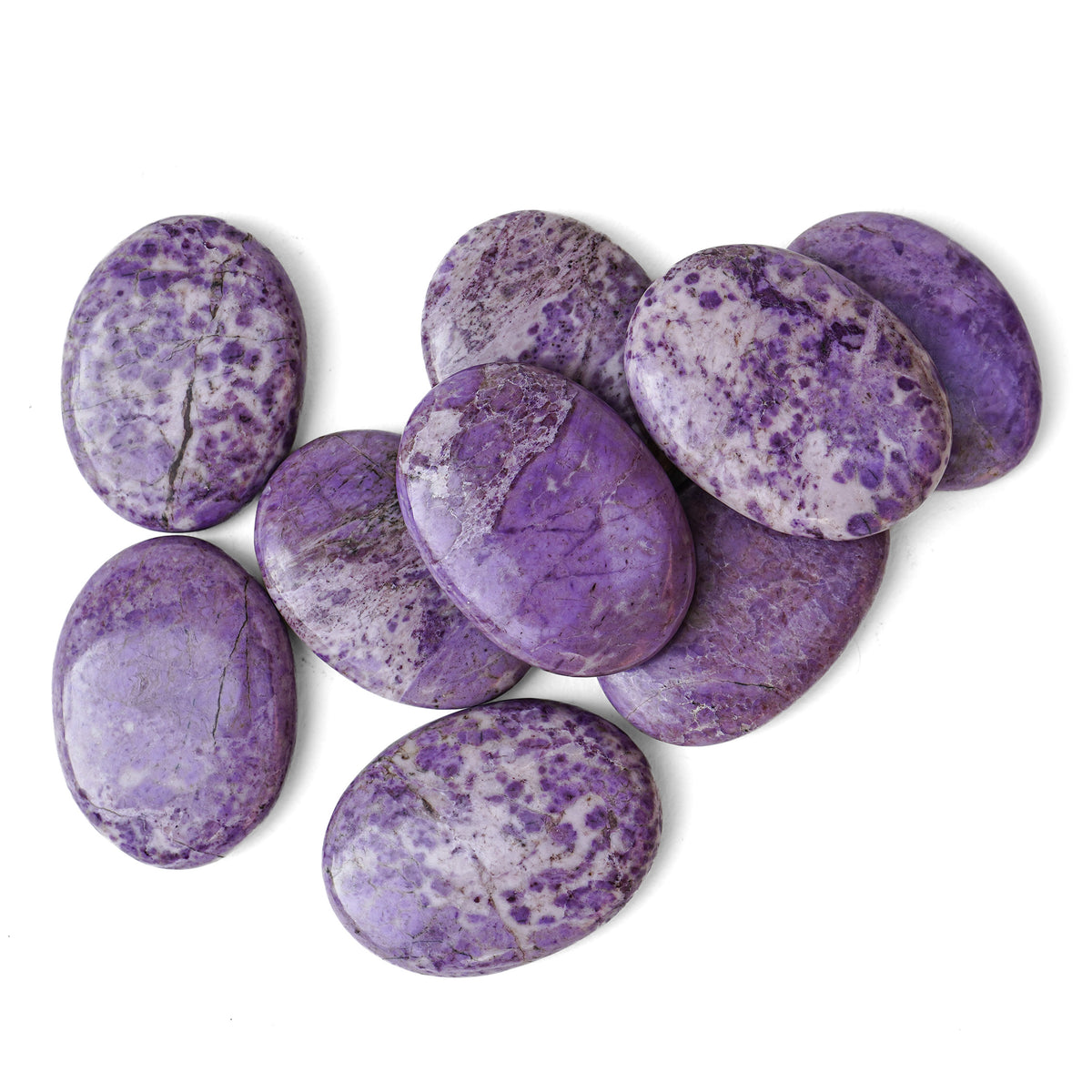 Polished Purple Jade palm stone showing natural colour and markings