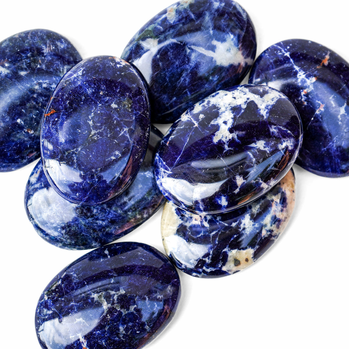 Polished Sodalite palm stone showing natural colour and markings